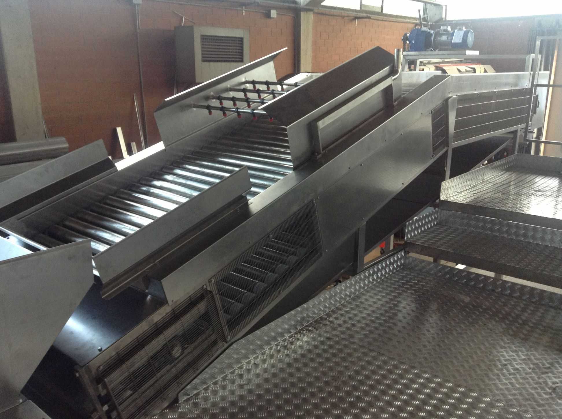 Piano di cernita a rulli